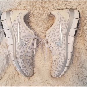 White/silver leopard Nike shoes